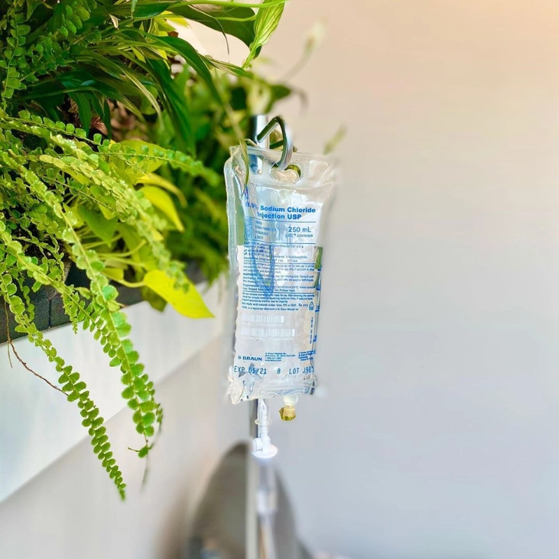 IV bag next to a outdoor plants